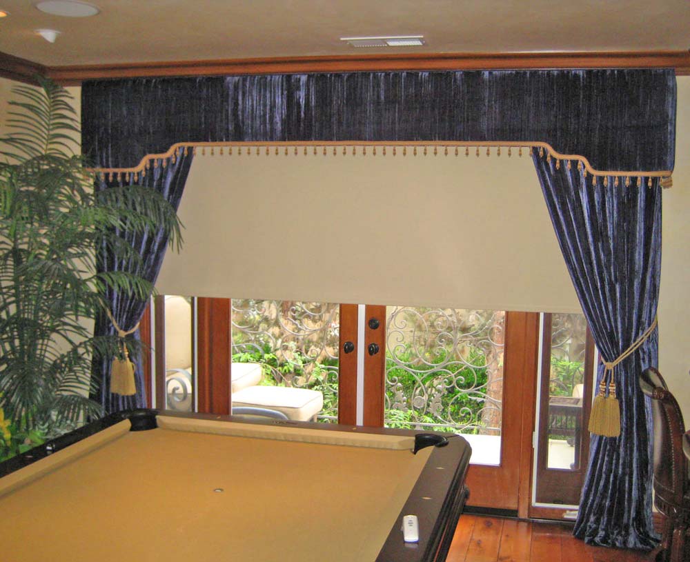 Top treatment valance with roller shades